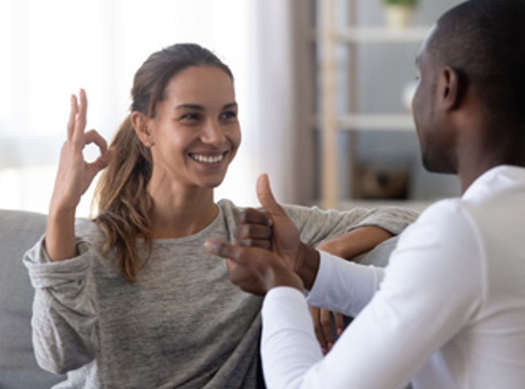 Two People Using Sign Language