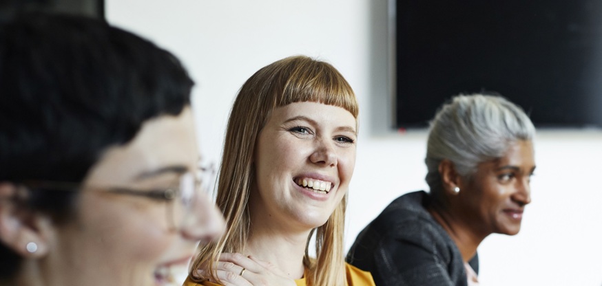 Women In A Meeting Wearing Yellow Top