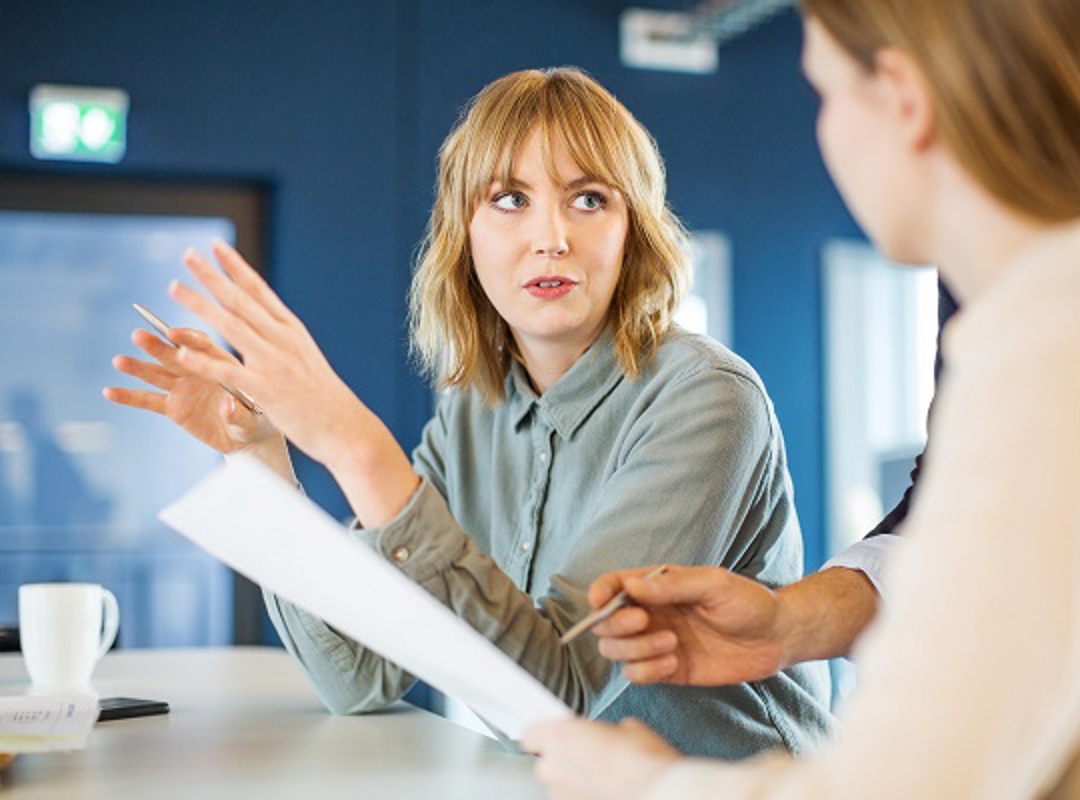 Two People In A Meeting Image