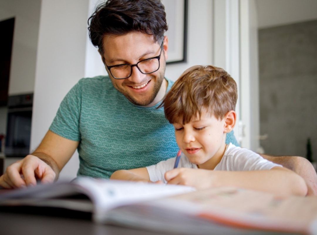 Child Reading With Parent Small